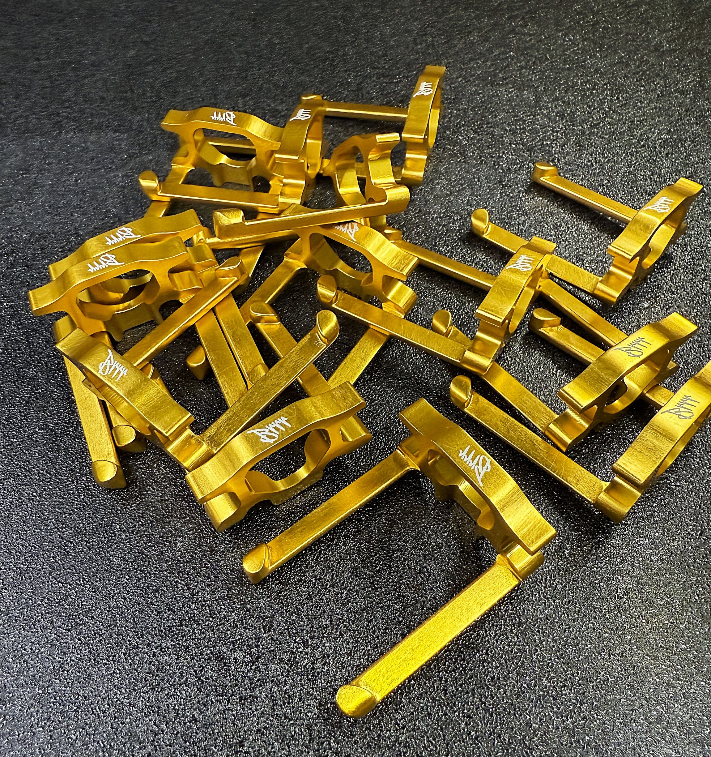 Gunetic Innovations V4 Slip Trip – Gold Anodized 7075-T6 Aluminum for MP5 Leber V2