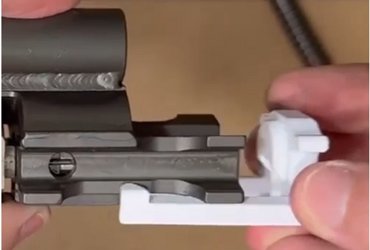 Trip Slip half installed on bolt carrier