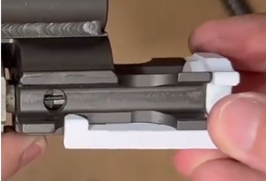 Trip Slip flush against bolt carrier